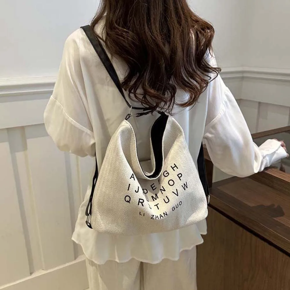 Polyester Letter Printed Handbags Soft Backpack Three Uses Canvas Bag Large Capacity Portable Retro Street Crossbody Bag Daily
Polyester Letter Printed Handbags Soft Backpack Three Uses Canvas Bag Large Capacity Portable Retro Street Crossbody Bag Daily