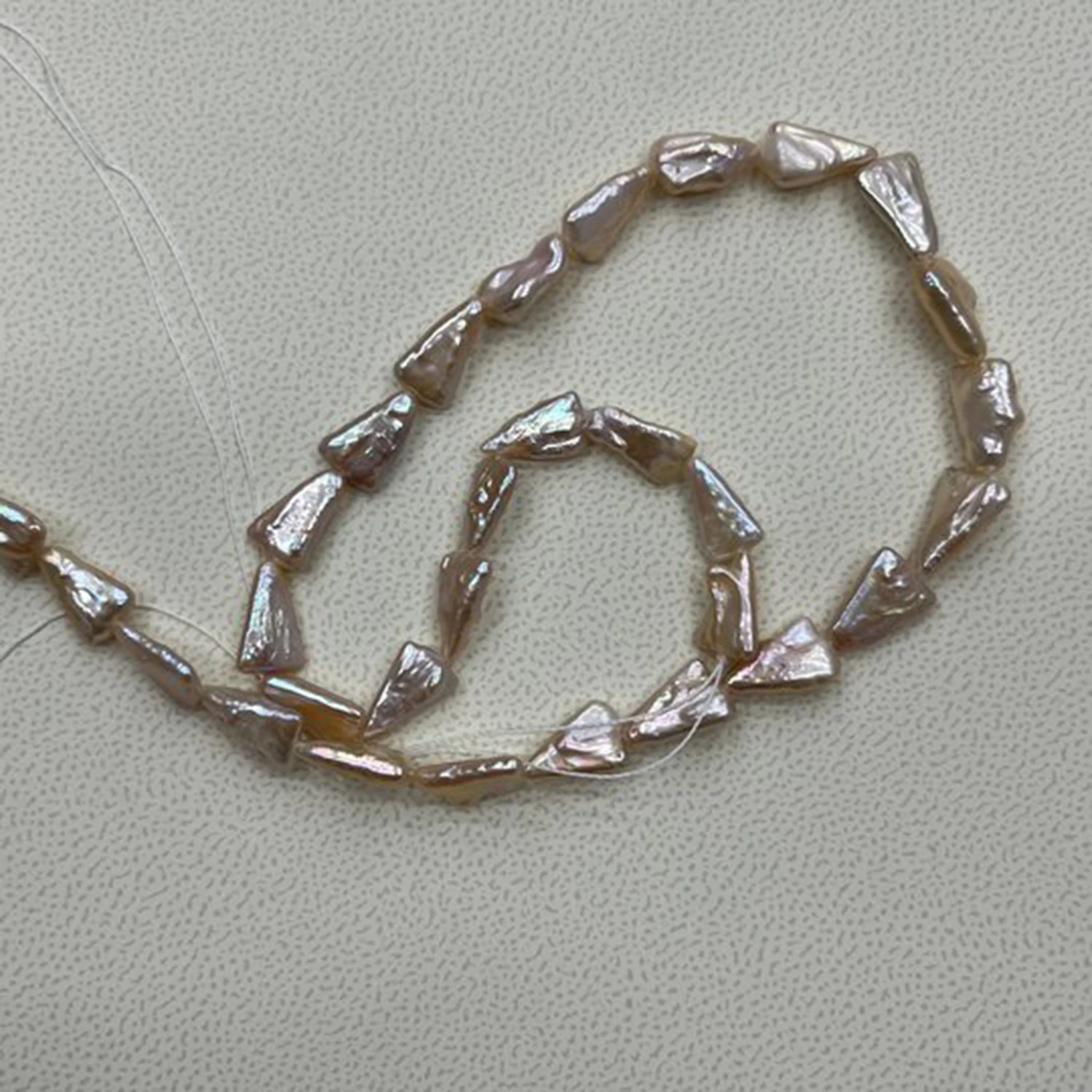6x11-7x12mm Natural Freshwater Baroque Factory Wholesale Pearls Triangular Irregular Necklace for DIY Jewelry Making Accessories
6x11-7x12mm Natural Freshwater Baroque Factory Wholesale Pearls Triangular Irregular Necklace for DIY Jewelry Making Accessories