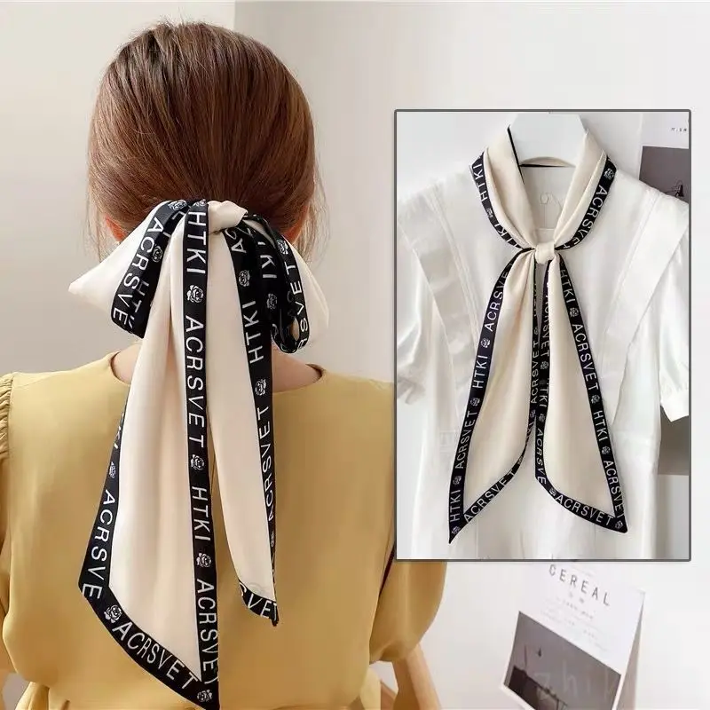 New retro solid color slender temperament streamer scarf versatile double-sided streamer spring and autumn accessories wholesale
New retro solid color slender temperament streamer scarf versatile double-sided streamer spring and autumn accessories wholesale