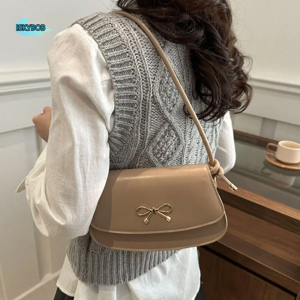 Trendy New Design Y2k Bow Shoulder Bags PU Leather Sweet Bowknot Armpit Bag Solid Color Luxury Women Handbag Girls
Trendy New Design Y2k Bow Shoulder Bags PU Leather Sweet Bowknot Armpit Bag Solid Color Luxury Women Handbag Girls