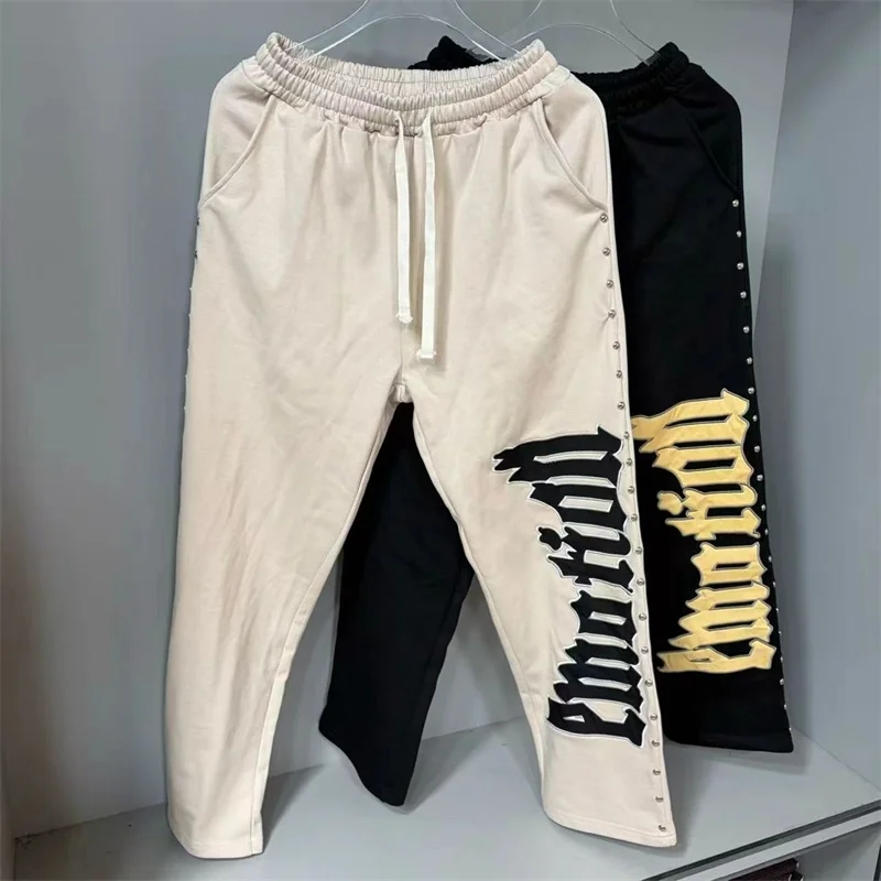 Mixed EMOTION Embroidered Riveted Casual Pants with Patchwork
Mixed EMOTION Embroidered Riveted Casual Pants with Patchwork
