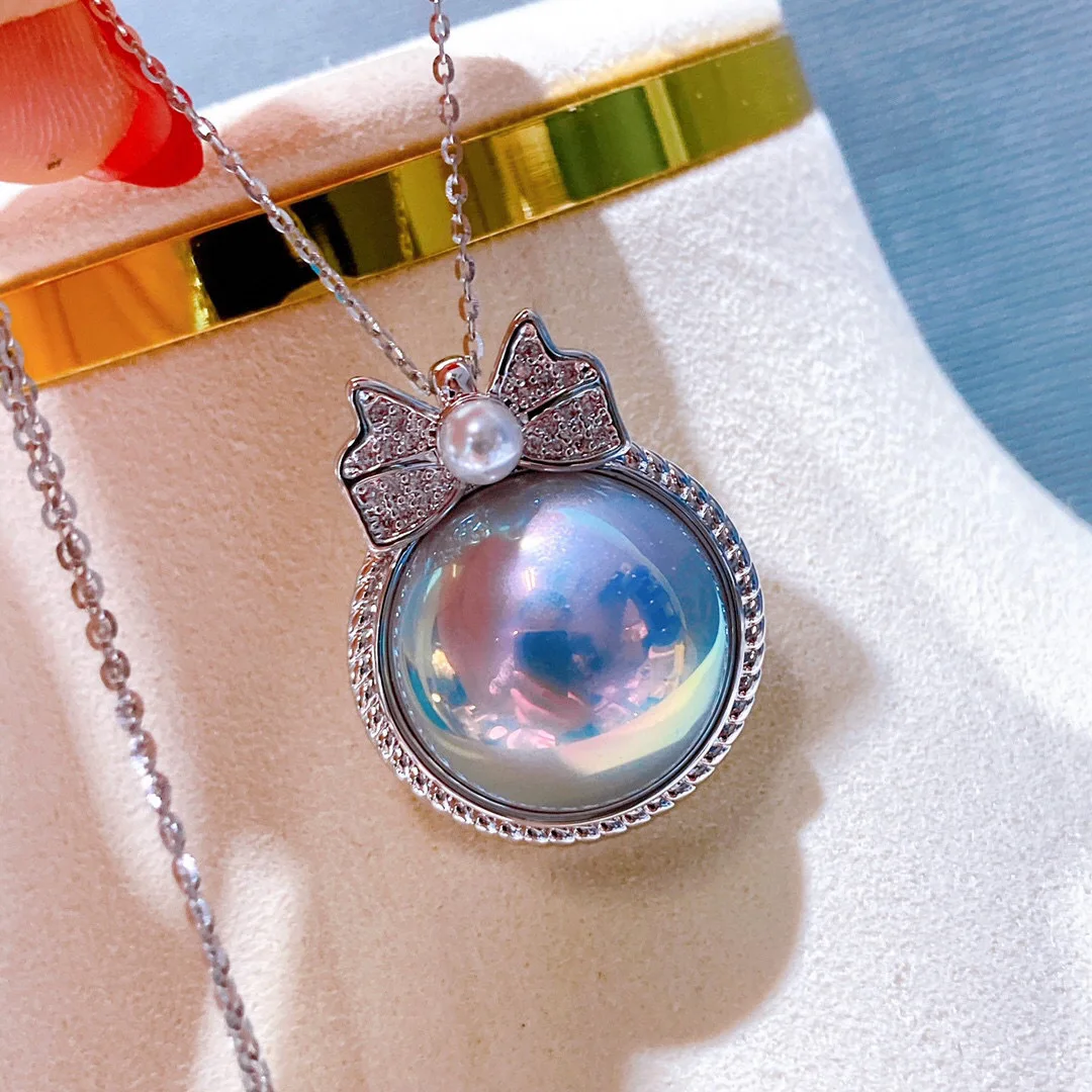 fashion Unique glaze color imitation horse shell pendant mirror light star sky blue bow can be added with chain separately
fashion Unique glaze color imitation horse shell pendant mirror light star sky blue bow can be added with chain separately