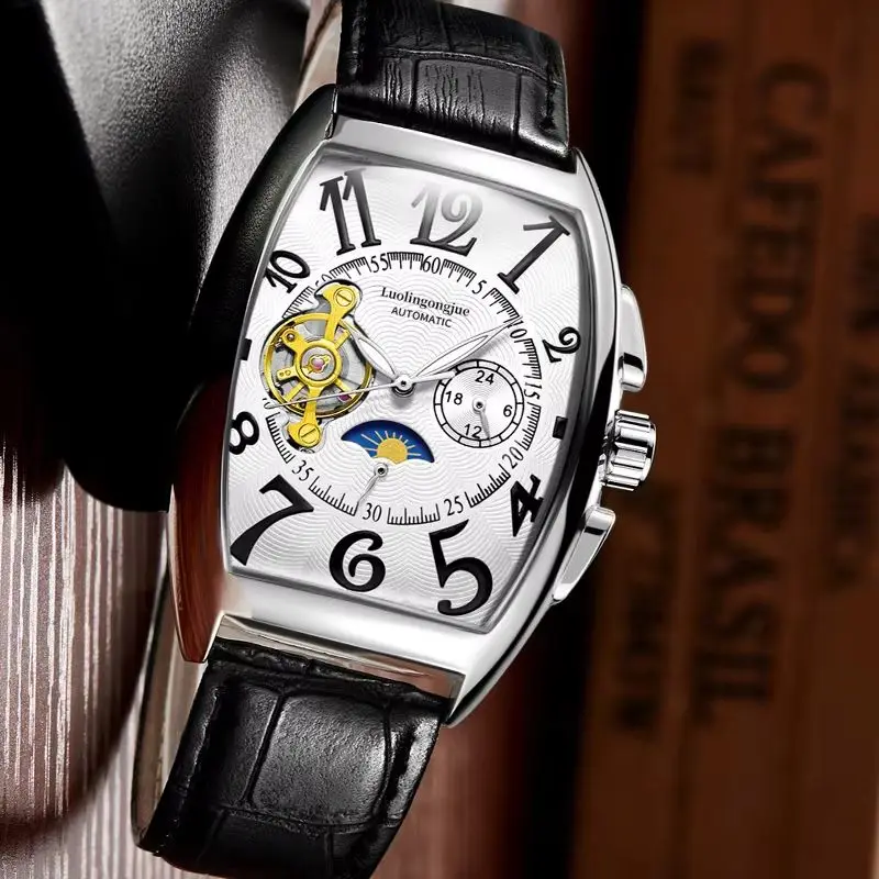 Полностью автоматические механические часы со скелетом и турбийоном для мужчин, большой циферблат, бочкообразная форма, студенческие деловые часы, модная корейский стиль, прозрачная задняя часть, изогнутое зеркало, высококачественные мужские часы, популяр
Полностью автоматические механические часы со скелетом и турбийоном для мужчин, большой циферблат, бочкообразная форма, студенческие деловые часы, модная корейский стиль, прозрачная задняя часть, изогнутое зеркало, высококачественные мужские часы, популяр
