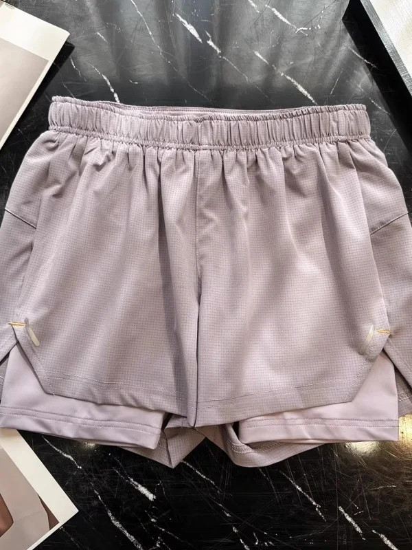 Summer 2026 Women's Outdoor Two-in-One Breathable Yoga Sports Running Shorts High Waist Patchwork Korean Style Commute Pants
Summer 2026 Women's Outdoor Two-in-One Breathable Yoga Sports Running Shorts High Waist Patchwork Korean Style Commute Pants