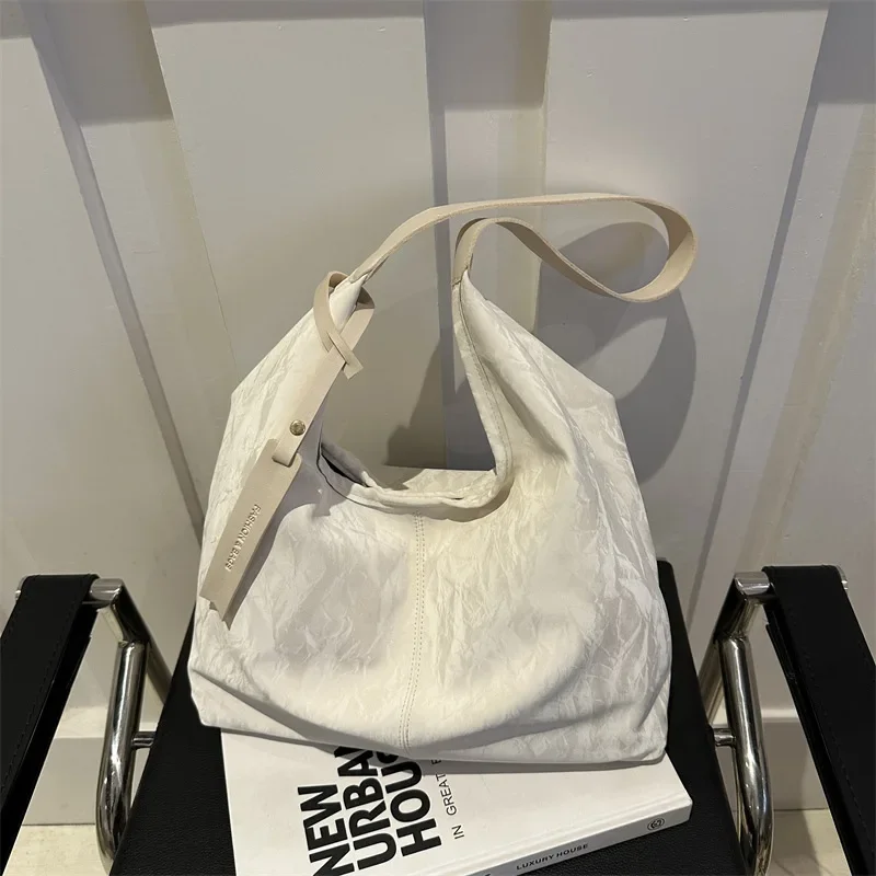 Solid color large capacity textured shoulder bag versatile ins underarm bag tote bag
Solid color large capacity textured shoulder bag versatile ins underarm bag tote bag