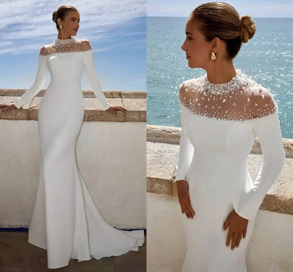 2026 Classic Mermaid Wedding Dress High Neck Shiny Pearls Long Sleeves Satin Bridal Bride Gowns Dresses Vestidos De Noiva
2026 Classic Mermaid Wedding Dress High Neck Shiny Pearls Long Sleeves Satin Bridal Bride Gowns Dresses Vestidos De Noiva