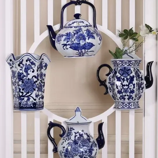 Blue and white porcelain wall-mounted hydroponic vase home creative flower arrangement wall-mounted green plant small flower pot
Blue and white porcelain wall-mounted hydroponic vase home creative flower arrangement wall-mounted green plant small flower pot
