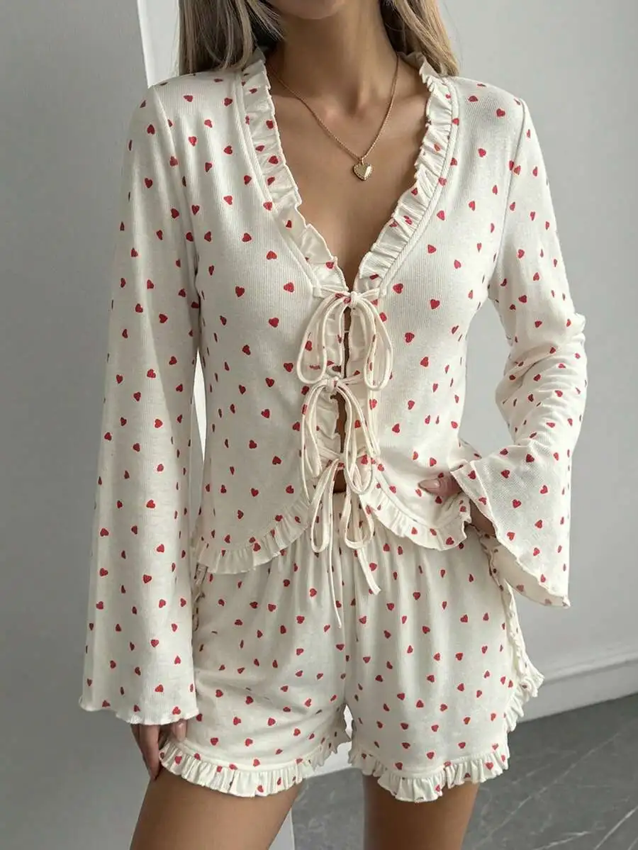 Women Heart Print Ruffle Trim Tie Front Crop Top And Shorts Pajama Set
Women Heart Print Ruffle Trim Tie Front Crop Top And Shorts Pajama Set