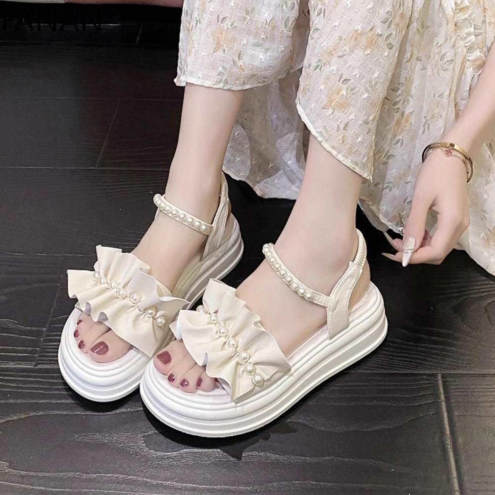 Новинка 2023 года, элегантные женские сандалии с французским жемчугом, летние сандалии на платформе на низком каблуке на плоской подошве, новинка 2025 года, римская обувь на плоской подошве
Новинка 2023 года, элегантные женские сандалии с французским жемчугом, летние сандалии на платформе на низком каблуке на плоской подошве, новинка 2025 года, римская обувь на плоской подошве