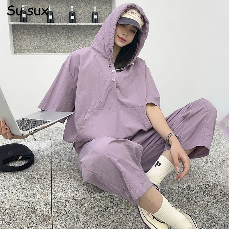 2025 Summer Sunscreen Solid Hooded Capri Pant Sets Woman 2 Pieces Casual Short Sleeve Pocket Tops Matching Sets Y2k Clothes
2025 Summer Sunscreen Solid Hooded Capri Pant Sets Woman 2 Pieces Casual Short Sleeve Pocket Tops Matching Sets Y2k Clothes