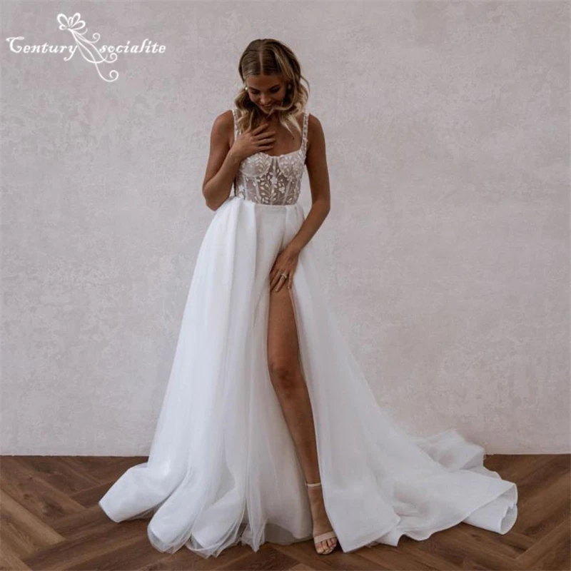 Princess Wedding Dresses 2025 Lace Appliques Tulle Side Slit Square Neck Backless A Line Bridal Gowns for Women Bride Customized
Princess Wedding Dresses 2025 Lace Appliques Tulle Side Slit Square Neck Backless A Line Bridal Gowns for Women Bride Customized
