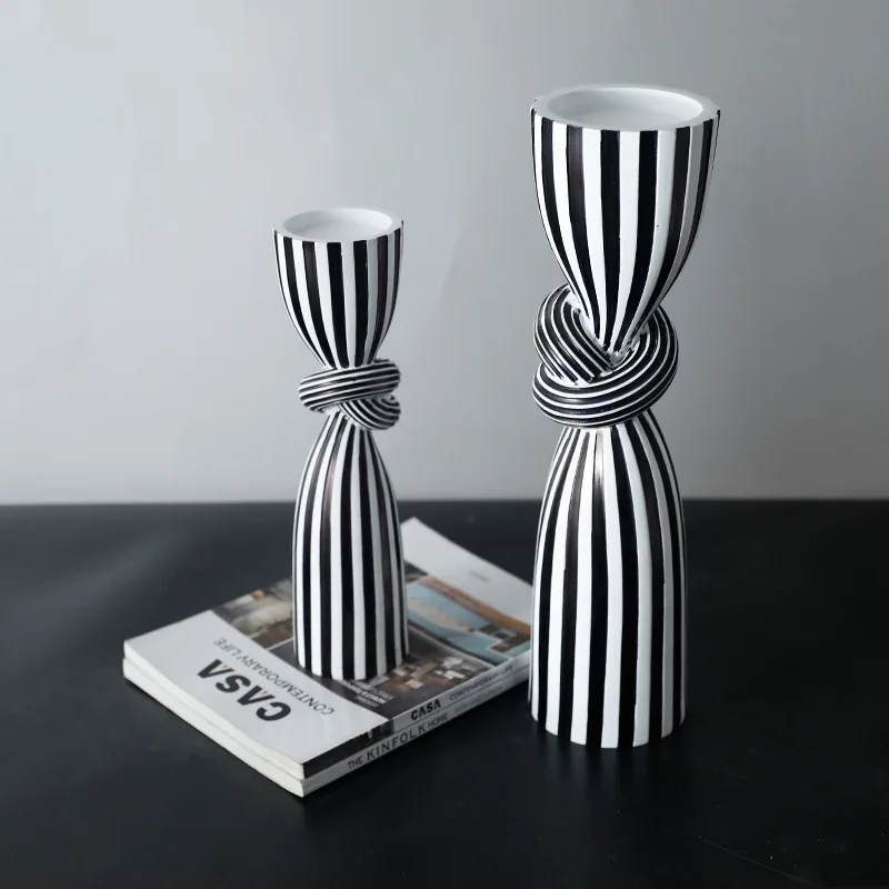 Creative knot shaped candle holder, simple black and white striped candle holder ornament, modern home living room decoration
Creative knot shaped candle holder, simple black and white striped candle holder ornament, modern home living room decoration