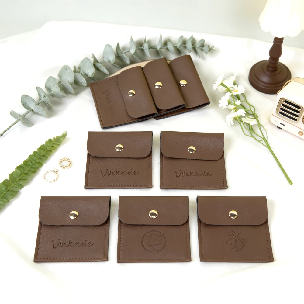 100Pcs 8x8cm Customizable Logo PU Snap Flip Jewelry Packaging Bag Flap Snap Pocket Logo Printed Earrings Cosmetic Storage Pouch
100Pcs 8x8cm Customizable Logo PU Snap Flip Jewelry Packaging Bag Flap Snap Pocket Logo Printed Earrings Cosmetic Storage Pouch