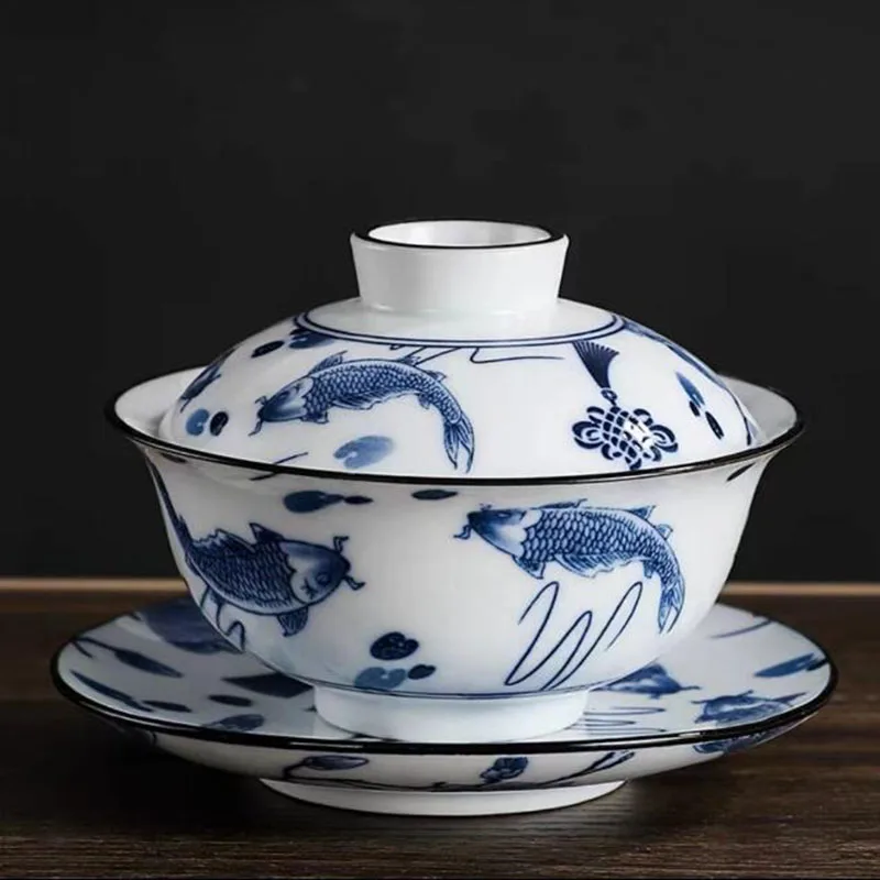 Celadon Lotus Fish Pattern Sancai Gaiwan Чайная заварочная чаша для чая Бытовая кухонная чайная посуда Аксессуары для питья
Celadon Lotus Fish Pattern Sancai Gaiwan Чайная заварочная чаша для чая Бытовая кухонная чайная посуда Аксессуары для питья