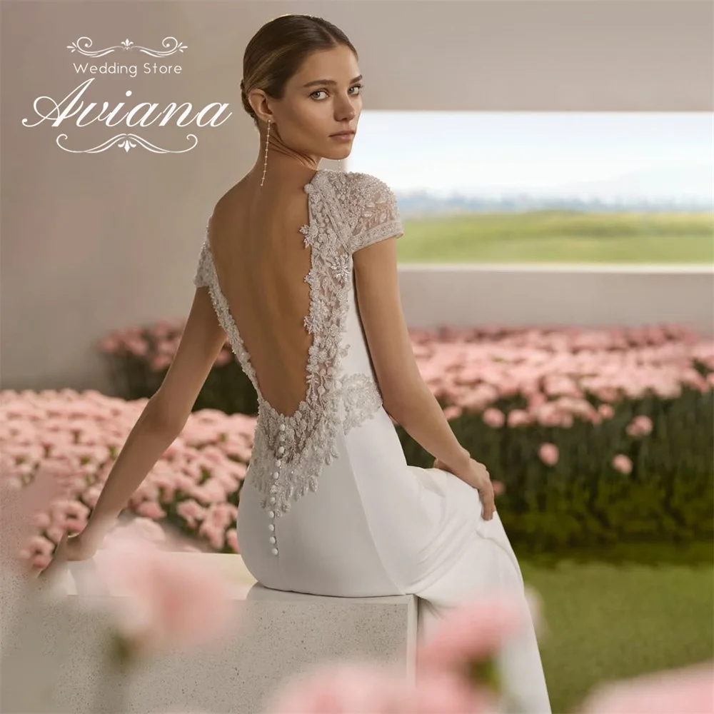 Aviana Customized Mermaid Wedding Dress Backless Sleeveless Appliques Lace Embroidery Floor Length O-Neck Short Sleeve Simple
Aviana Customized Mermaid Wedding Dress Backless Sleeveless Appliques Lace Embroidery Floor Length O-Neck Short Sleeve Simple