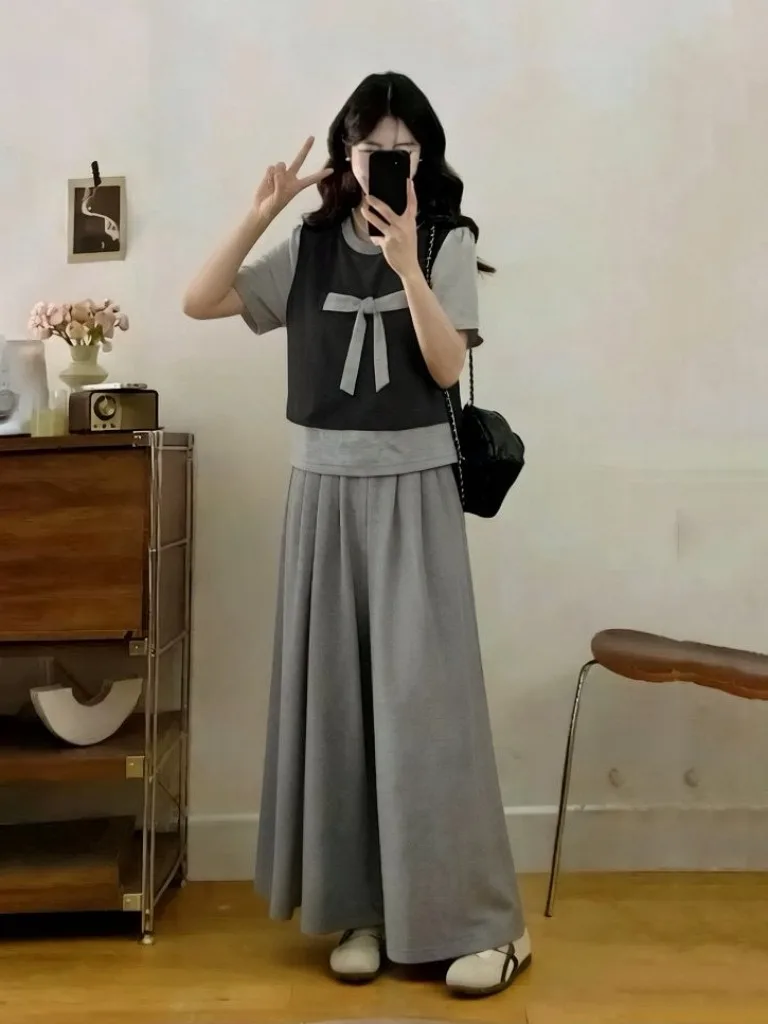 Loose Korean Style Summer New plus Size Women's Outfit with Knot Short Sleeve Top And Wide Leg Pants Two Piece Set
Loose Korean Style Summer New plus Size Women's Outfit with Knot Short Sleeve Top And Wide Leg Pants Two Piece Set