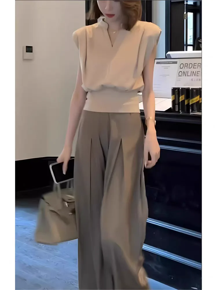 2026 Women Blouses V-neck Sleeveless Shirts Temperament Solid Color Crop Tops Summer Vintage All Match Blouse Ladies Pullover
2026 Women Blouses V-neck Sleeveless Shirts Temperament Solid Color Crop Tops Summer Vintage All Match Blouse Ladies Pullover