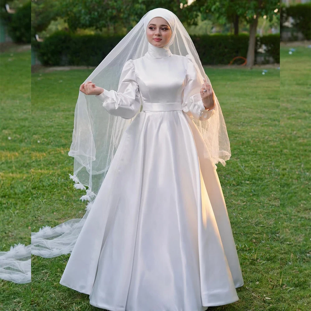 Modest Muslim Wedding Dresses with High Neck Long Sleeve A-Line Garden Bridal Gowns Customized свадебное платье 
Modest Muslim Wedding Dresses with High Neck Long Sleeve A-Line Garden Bridal Gowns Customized свадебное платье