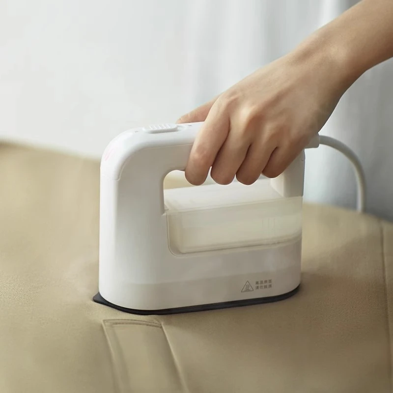 Handheld hanging iron ironing machine household small clothes steam ironing 
Handheld hanging iron ironing machine household small clothes steam ironing