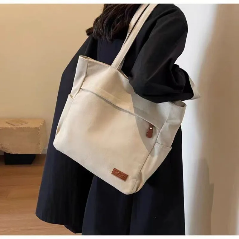 Canvas Women Shoulder Bag Female Student Tote Shopper Bag 2025 Large Kpop Fashion Bookbag Cotton Cloth Japanese Woman Handbag
Canvas Women Shoulder Bag Female Student Tote Shopper Bag 2025 Large Kpop Fashion Bookbag Cotton Cloth Japanese Woman Handbag