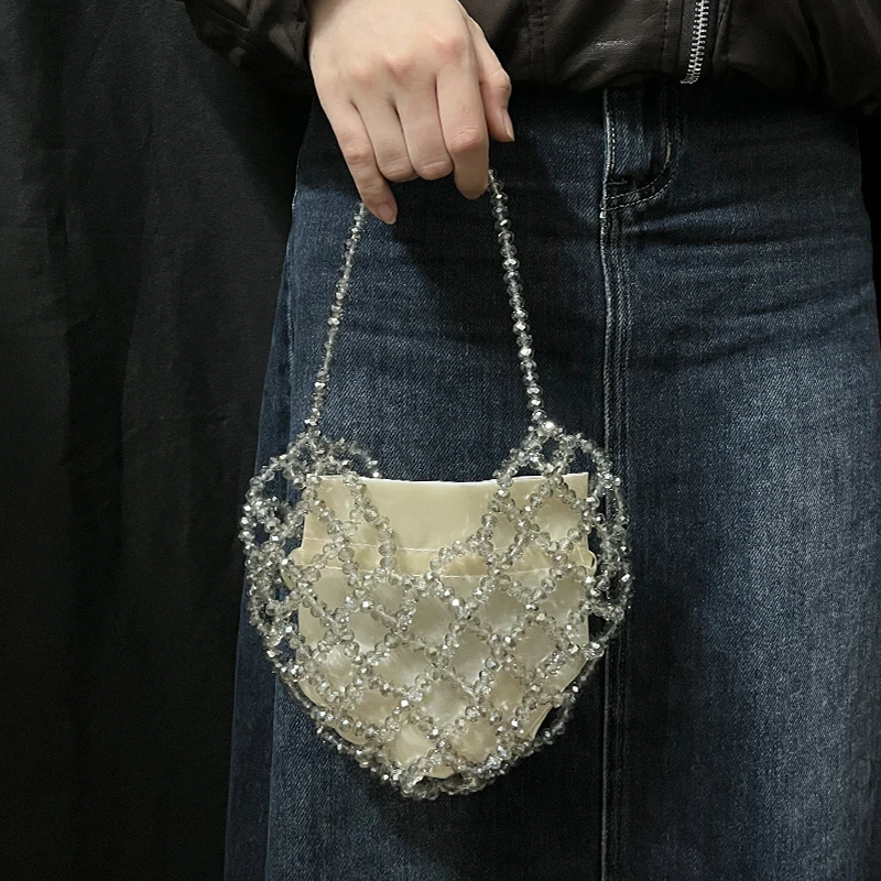 Корейская сумка ручной работы с плетеными бусинами, на плечо, кроссбоди, нишевый дизайн, с имитацией жемчуга, женская сумка-клатч
Корейская сумка ручной работы с плетеными бусинами, на плечо, кроссбоди, нишевый дизайн, с имитацией жемчуга, женская сумка-клатч