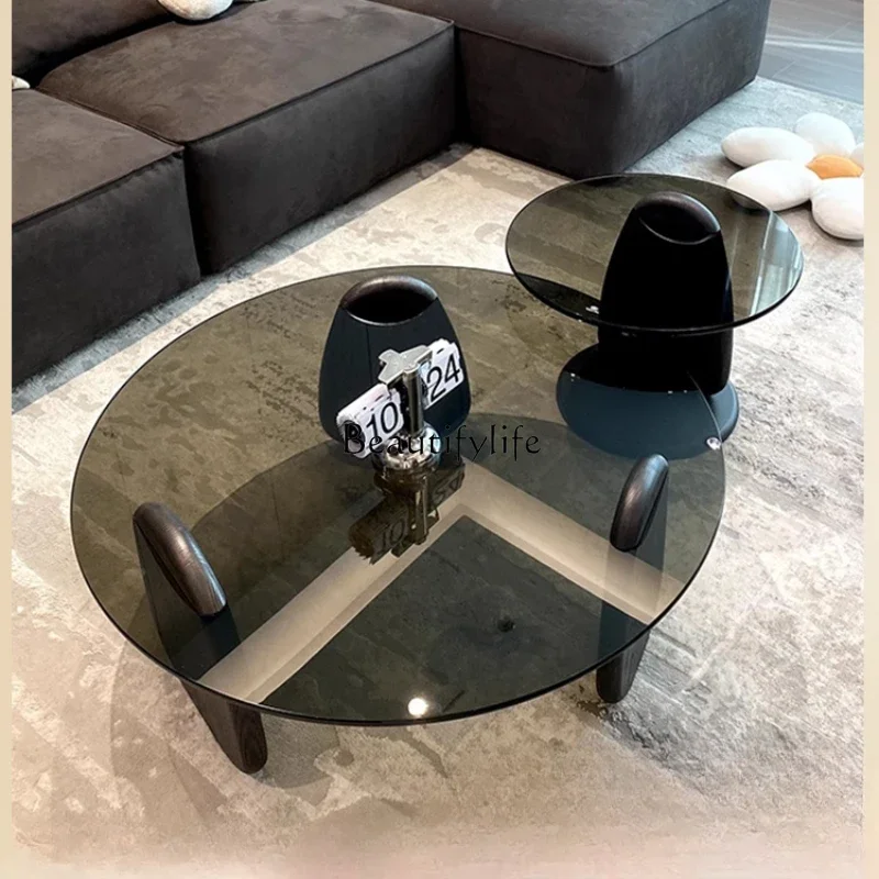 Modern simple glass coffee table combination creative living room home wabi-sandy wind solid wood coffee table
Modern simple glass coffee table combination creative living room home wabi-sandy wind solid wood coffee table
