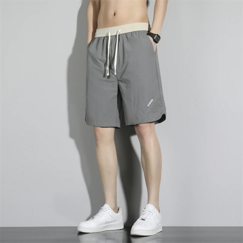 Men's Summer Thin Ice Silk Quick Dry Five-Quarter Shorts Loose Basketball Sports Casual Pants Lightweight Breathable Shorts
Men's Summer Thin Ice Silk Quick Dry Five-Quarter Shorts Loose Basketball Sports Casual Pants Lightweight Breathable Shorts