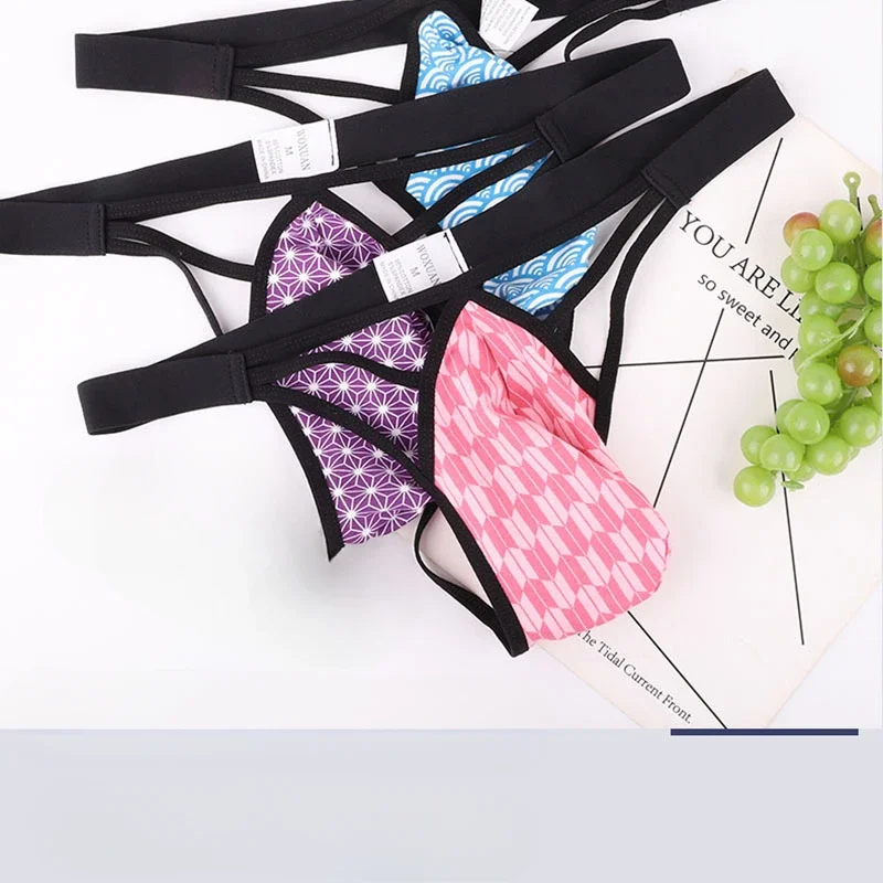 New Sexy Pouch Bag Thongs Cute Mens Printing Underwear Hollow Out Male Lingerie String Homme Low Rise Man G-String T-Back Briefs
New Sexy Pouch Bag Thongs Cute Mens Printing Underwear Hollow Out Male Lingerie String Homme Low Rise Man G-String T-Back Briefs