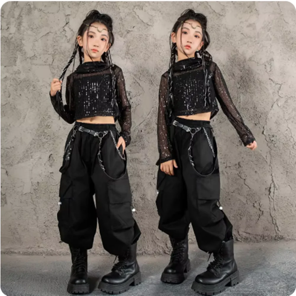 Костюм танцевальный черный в стиле K-POP для девочек, одежда для выступлений в стиле хип-хоп, крутая детская одежда для уличных танцев, худи, штаны-карго, осень
Костюм танцевальный черный в стиле K-POP для девочек, одежда для выступлений в стиле хип-хоп, крутая детская одежда для уличных танцев, худи, штаны-карго, осень