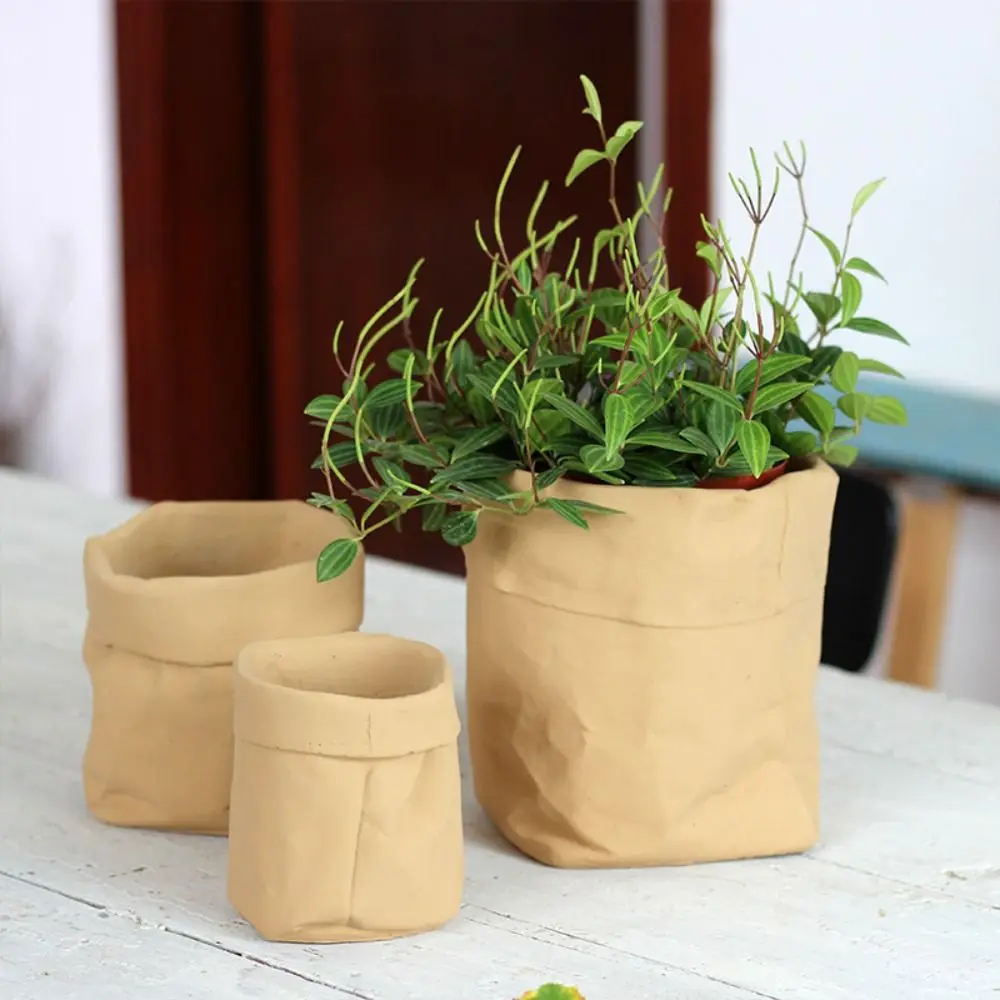 Imitation Paper Bag Flowerpot Handicraft Cement Vase Ornament Simulated Hydroponic Flower Holder Green Plants Potted
Imitation Paper Bag Flowerpot Handicraft Cement Vase Ornament Simulated Hydroponic Flower Holder Green Plants Potted