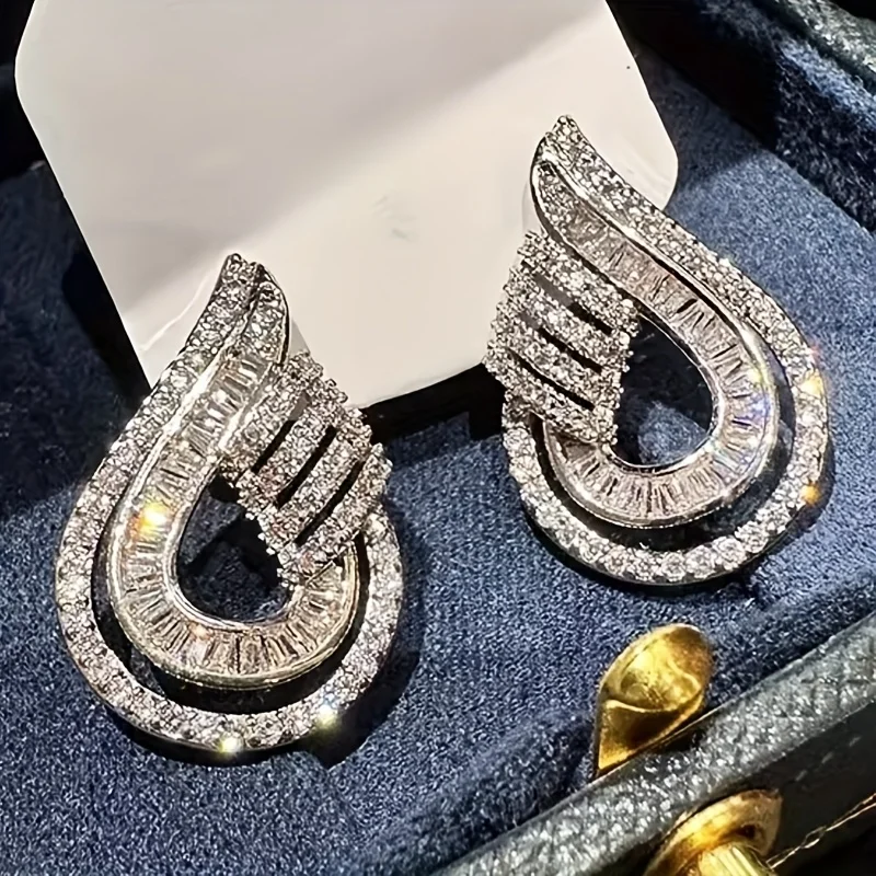 Luxury Fashion Silver Color Geometry Inlaid Cubic Zirconia Women's Earrings Exquisite Engagement Wedding Dangle Earrings Woman
Luxury Fashion Silver Color Geometry Inlaid Cubic Zirconia Women's Earrings Exquisite Engagement Wedding Dangle Earrings Woman