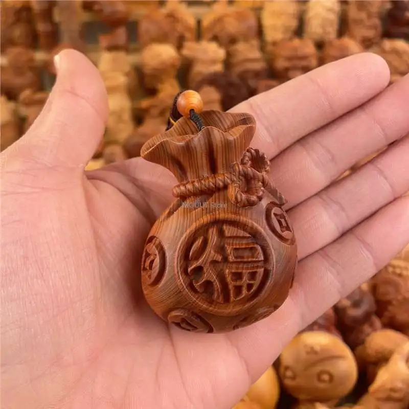 Natural Cliff Cypress Handheld Piece-Solid Wood Carved Money Pouch Pendant, Material Fortune Wealth Bag, Playable Craftwork
Natural Cliff Cypress Handheld Piece-Solid Wood Carved Money Pouch Pendant, Material Fortune Wealth Bag, Playable Craftwork