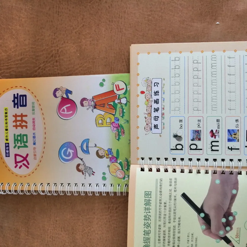 Groove Copybook Writing Practice Book Creative Calligraphy Style for Preschoolers Orange Pinyin Learn Chinese English Words Math
Groove Copybook Writing Practice Book Creative Calligraphy Style for Preschoolers Orange Pinyin Learn Chinese English Words Math