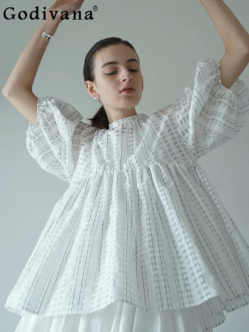 Japanese Lantern Sleep Hollow Pleated Gauze Temperament All-Match White Shirts Women Loose Slim Casual Blouse Summer Y2k Clothes
Japanese Lantern Sleep Hollow Pleated Gauze Temperament All-Match White Shirts Women Loose Slim Casual Blouse Summer Y2k Clothes