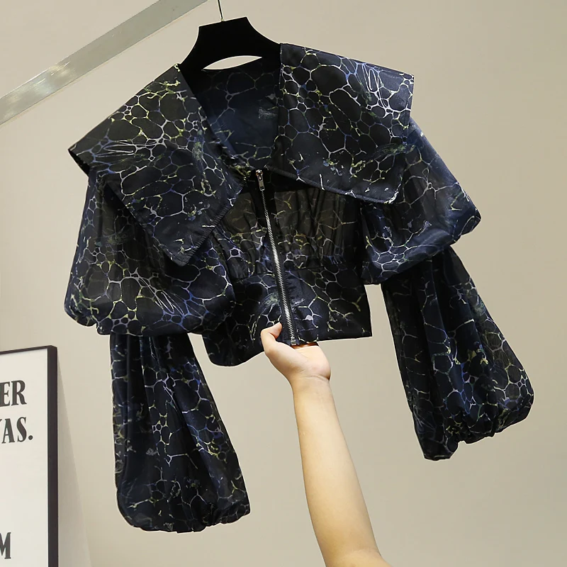 Faionable Zipper Waist Cinched ort Silk Floral Print irt Bubble Sve Turn down Collar Korean Sle Commute Wind Blouse
Faionable Zipper Waist Cinched ort Silk Floral Print irt Bubble Sve Turn down Collar Korean Sle Commute Wind Blouse