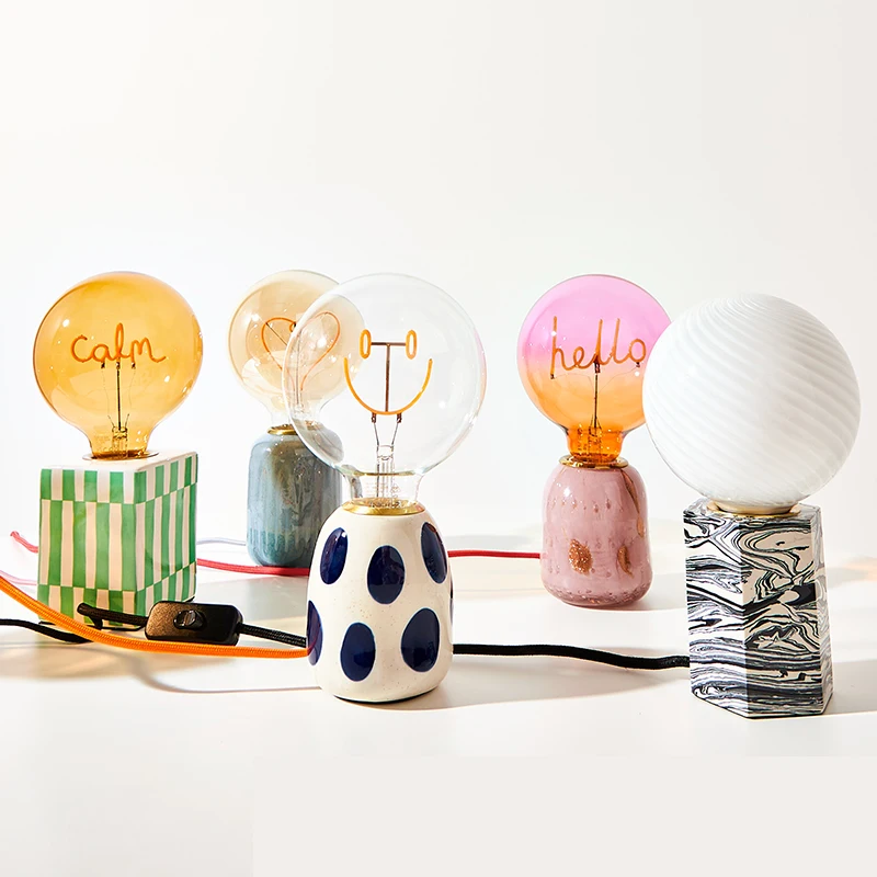 E Home - Blue Polka Dot Desk Lamp Ceramic Cute Smiley Face Nordic Designer French Retro Bedroom Bedside Ambient Light
E Home - Blue Polka Dot Desk Lamp Ceramic Cute Smiley Face Nordic Designer French Retro Bedroom Bedside Ambient Light
