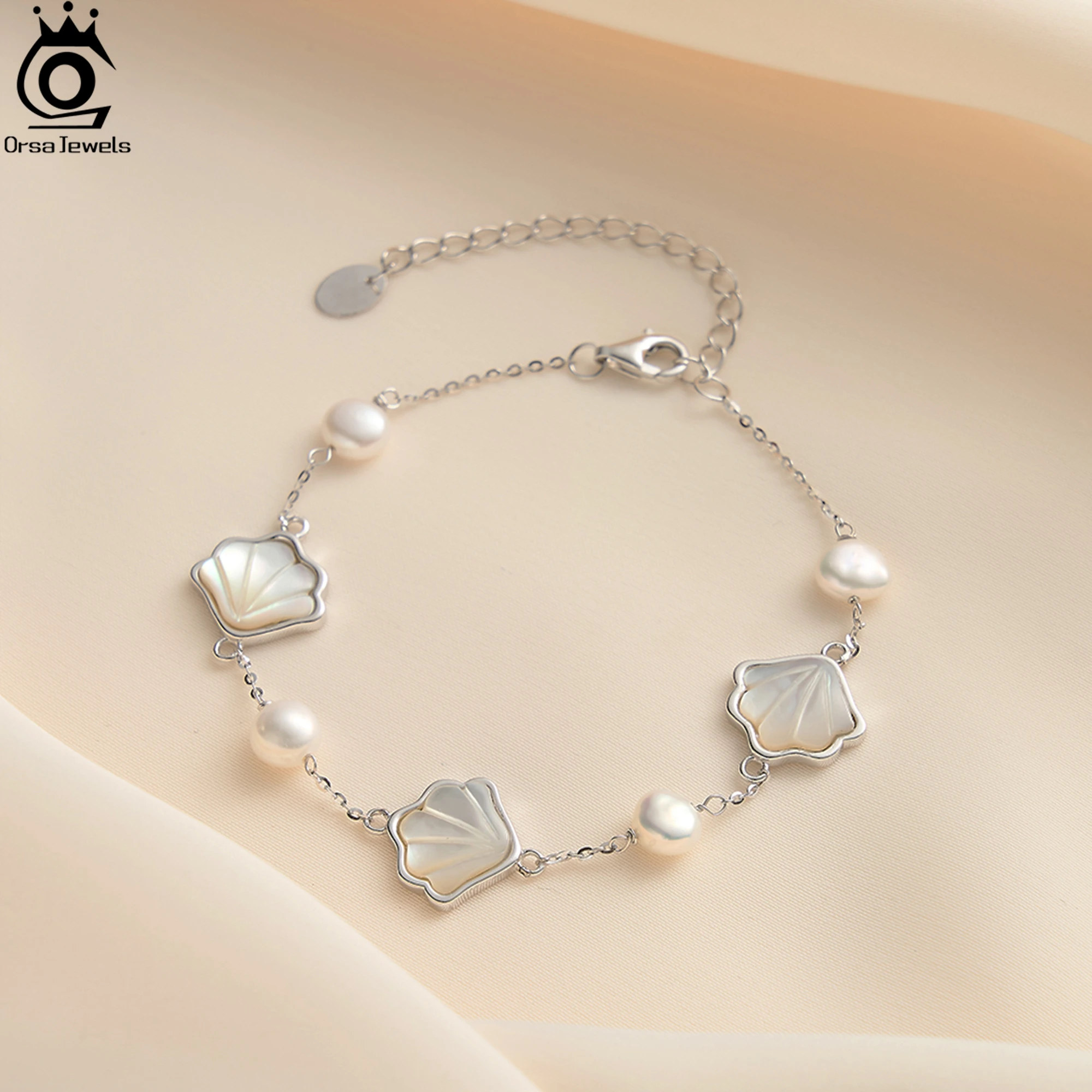 ORSA JEWELS Dainty Conch Shell Bracelet 925 Sterling Silver Ocean-Inspired Beach Jewelry Gift for Women Shell Link Chain GPB41
ORSA JEWELS Dainty Conch Shell Bracelet 925 Sterling Silver Ocean-Inspired Beach Jewelry Gift for Women Shell Link Chain GPB41