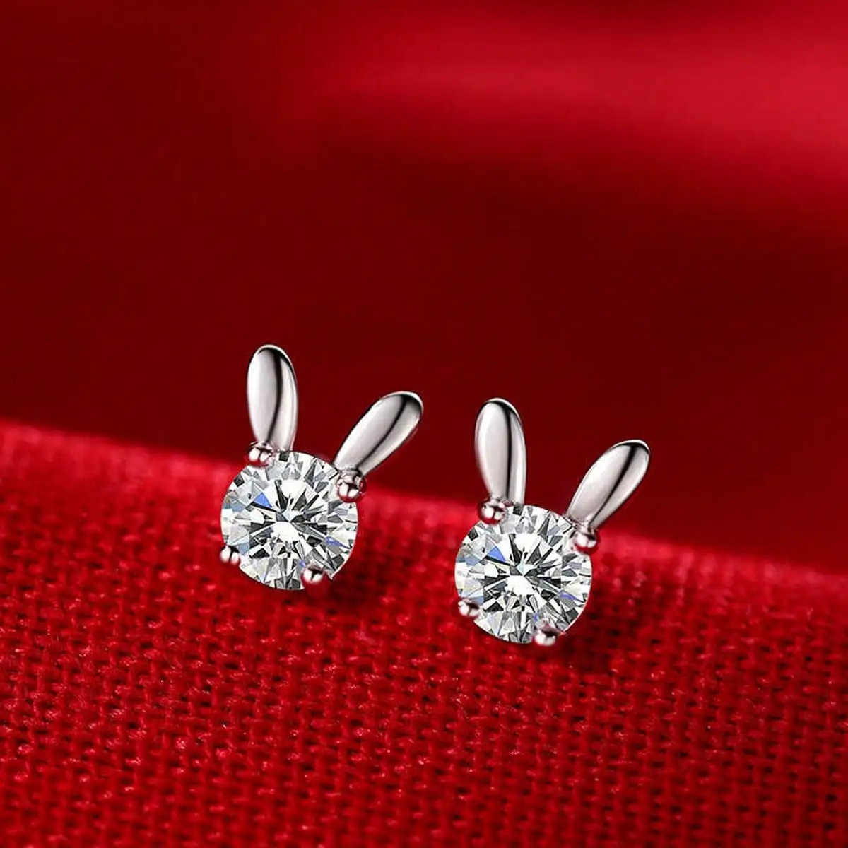 Shiny Cubic Zirconia Stud Earrings with Bunny Ear Silhouette Design for Women
Shiny Cubic Zirconia Stud Earrings with Bunny Ear Silhouette Design for Women