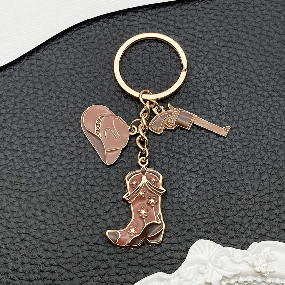 American retro brown western cowboy hat boots pistol pendant sweet cool wind messenger bag pendant couple keychain
American retro brown western cowboy hat boots pistol pendant sweet cool wind messenger bag pendant couple keychain