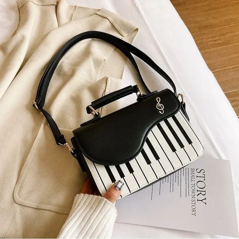 Novelty Piano Pattern PU Leather Crossbody Bags For Women Embroidery Note Shoulder Hand Bag Ladies Fashion Purses and Handbags
Novelty Piano Pattern PU Leather Crossbody Bags For Women Embroidery Note Shoulder Hand Bag Ladies Fashion Purses and Handbags