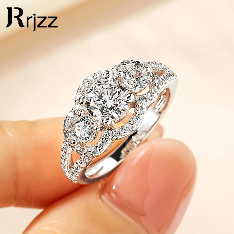 Rrjzz Brilliant 1CT Moissanite Zirconia Women's Engagement Ring Exquisite 925 Sterling Silver Wedding Rings Trendy Jewelry Gift
Rrjzz Brilliant 1CT Moissanite Zirconia Women's Engagement Ring Exquisite 925 Sterling Silver Wedding Rings Trendy Jewelry Gift