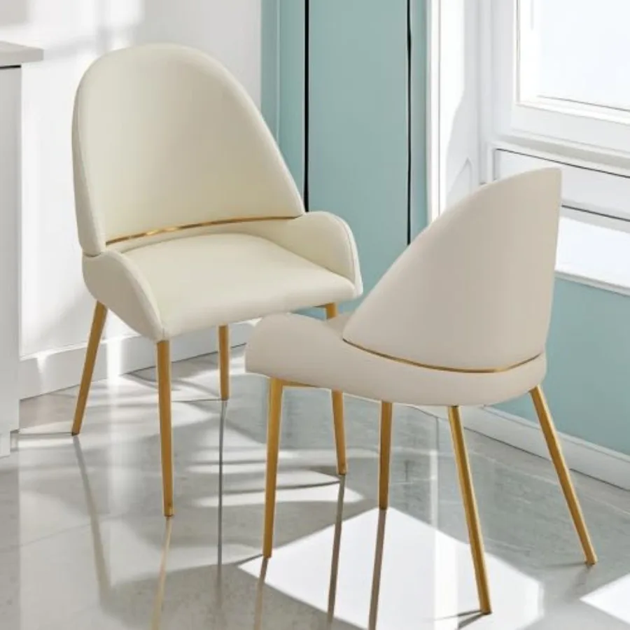 Set of 2 Modern Dining Chairs in Cream White Faux Leather with Gold Metal Legs and Ergonomic Curved Backrest for Living Kitchen
Set of 2 Modern Dining Chairs in Cream White Faux Leather with Gold Metal Legs and Ergonomic Curved Backrest for Living Kitchen