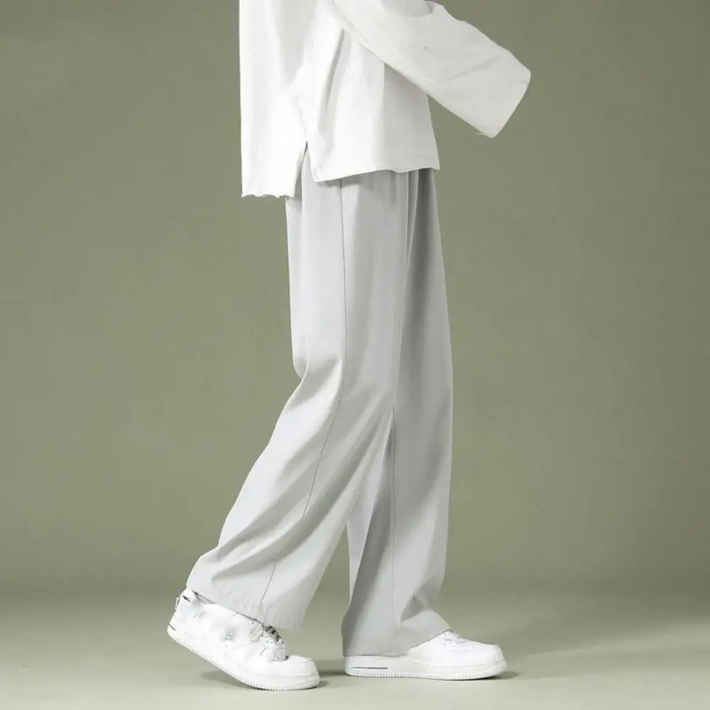Simple Wide Leg Men Ice Silk Pants Baggy Oversized Straight Loose Trousers Quick Dry Korean Style Sweatpants Men Summer
Simple Wide Leg Men Ice Silk Pants Baggy Oversized Straight Loose Trousers Quick Dry Korean Style Sweatpants Men Summer