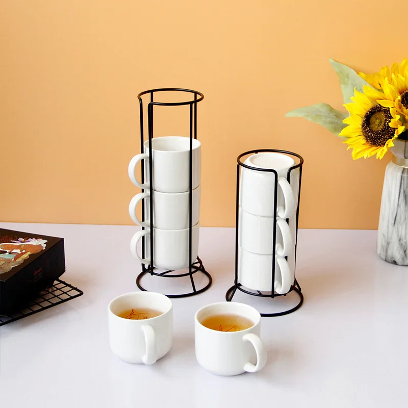 Minimalist Ceramic Mark Cup Set Three Piece Set Four Piece Set with Black Metal Stand for Home and Office Drinks
Minimalist Ceramic Mark Cup Set Three Piece Set Four Piece Set with Black Metal Stand for Home and Office Drinks
