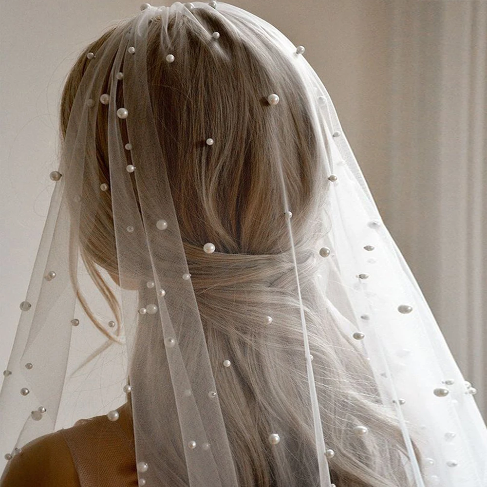 2 tier short waist-hip length bride veil, abundant pearls simple wedding accessory, soft tulle women's veil with hair comb
2 tier short waist-hip length bride veil, abundant pearls simple wedding accessory, soft tulle women's veil with hair comb