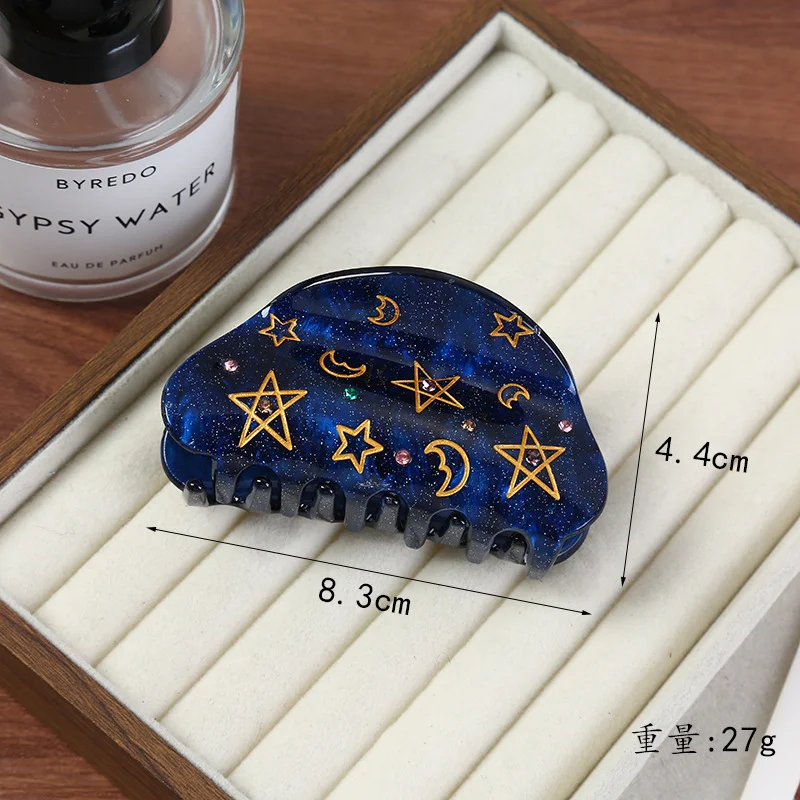 A half-circle star and moon design, with prongs and claw settings, is perfect for elegant, sweet and fashionable occasions.
A half-circle star and moon design, with prongs and claw settings, is perfect for elegant, sweet and fashionable occasions.