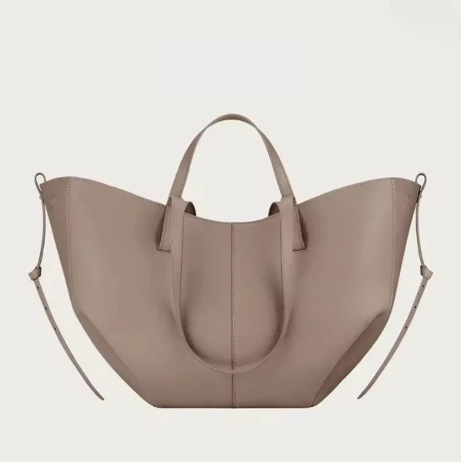 Bolso de mano de gran capacidad estilo elegante Vintage con forma de cubo debajo de los reposabrazos bolso de tendenciaversátil
Bolso de mano de gran capacidad estilo elegante Vintage con forma de cubo debajo de los reposabrazos bolso de tendenciaversátil