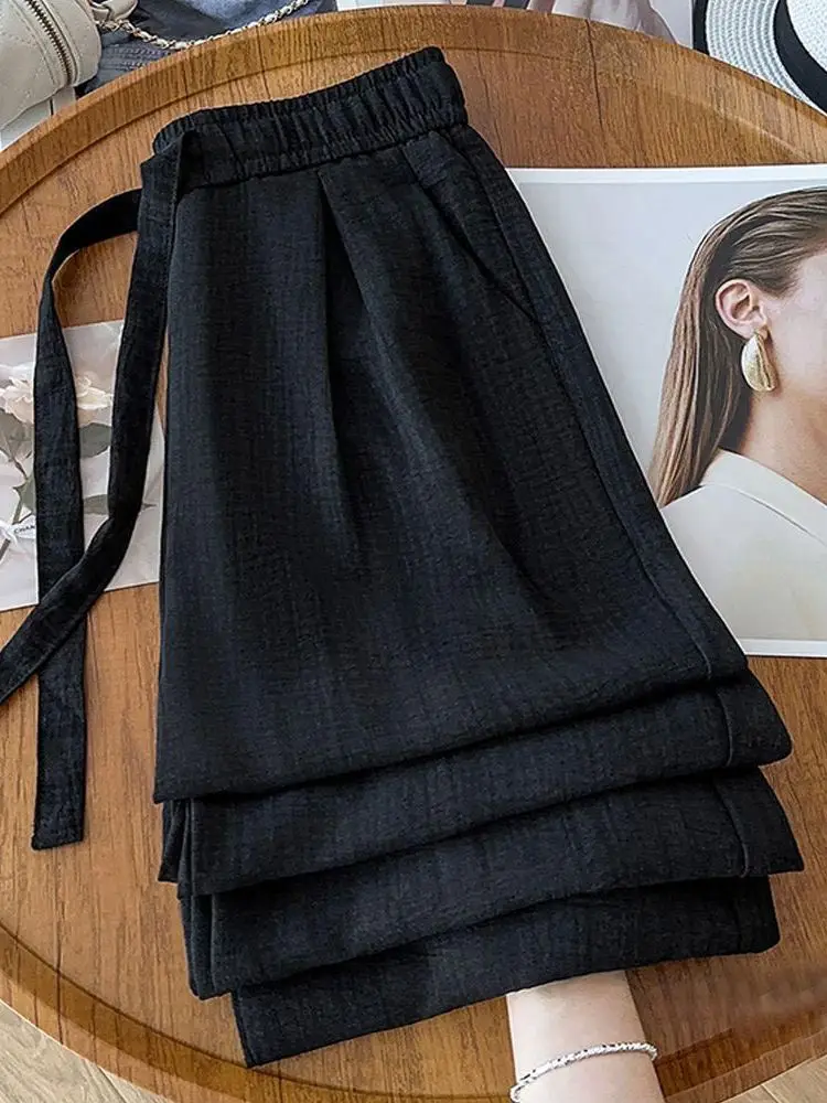 Широкие повседневные брюки больших размеров в американском ретро-стиле, струящиеся, комфортные, летние, новинка, женские брюки с высокой талией
Широкие повседневные брюки больших размеров в американском ретро-стиле, струящиеся, комфортные, летние, новинка, женские брюки с высокой талией