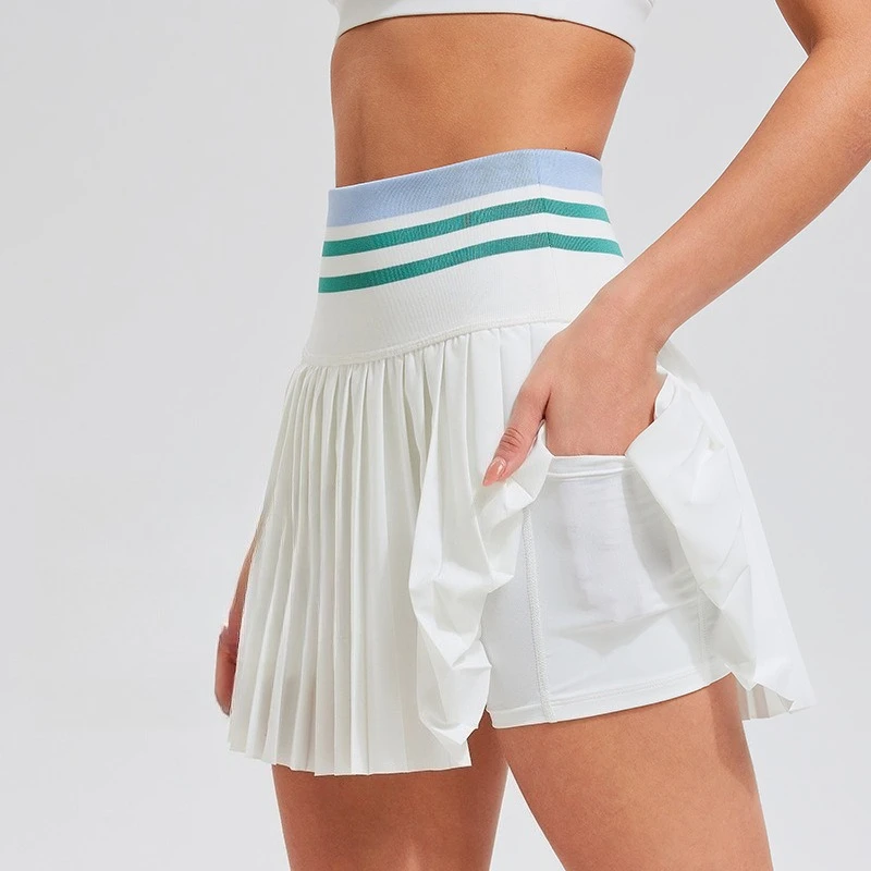 Women's Pleated Tennis Skirt with Built-in Safety Pants and Pockets High-Waisted Athletic Skirt for Sports and Workout
Women's Pleated Tennis Skirt with Built-in Safety Pants and Pockets High-Waisted Athletic Skirt for Sports and Workout