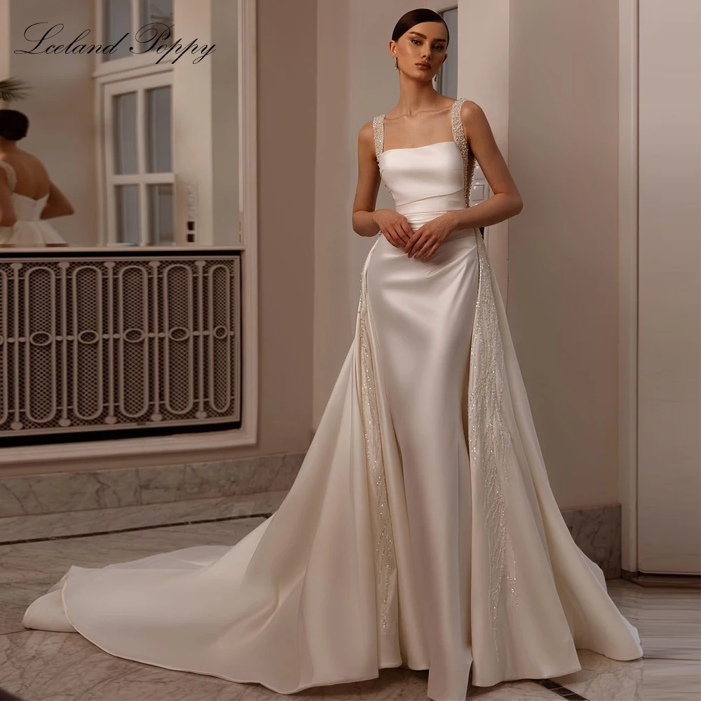 Lceland Poppy Customized 2 Pieces Mermaid Satin Wedding Dresses Sleeveless Beaded Lace Bridal Gowns with Detachable Train
Lceland Poppy Customized 2 Pieces Mermaid Satin Wedding Dresses Sleeveless Beaded Lace Bridal Gowns with Detachable Train
